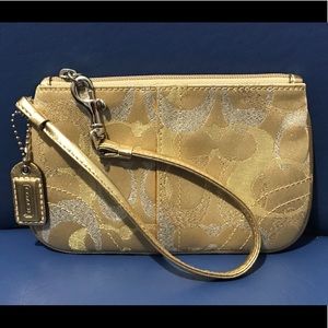 Coach silver/gold signature wristlet